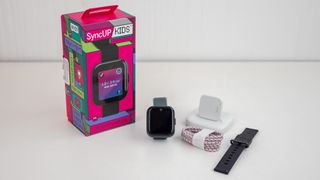 The T-Mobile SyncUP Kids Watch alongside the box and its contents
