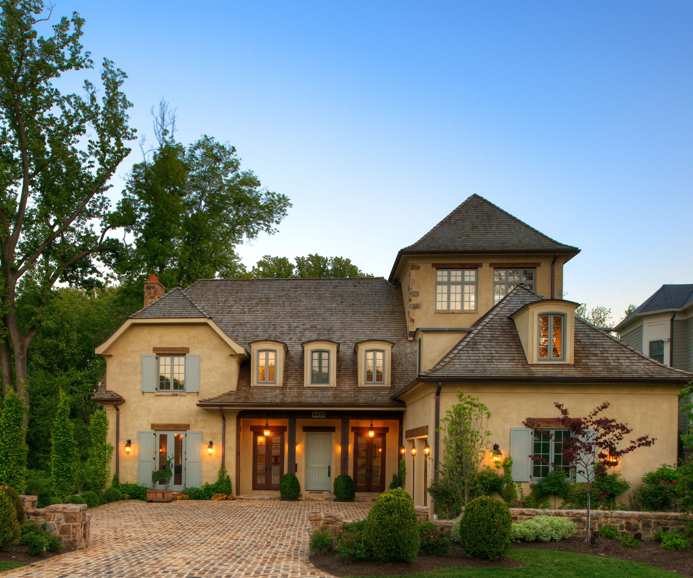 Home with custom European-style warm plaster exterior finish