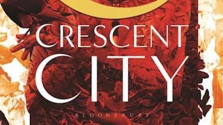 The words Crescent City in white on the cover of House of Earth and Blood