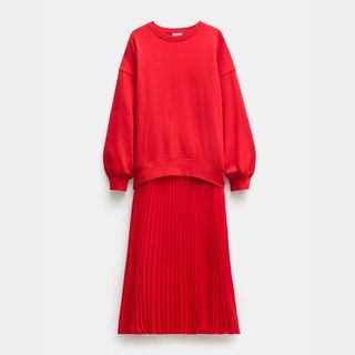 A cutout of a red Hush Sweatshirt Dress against a pale background