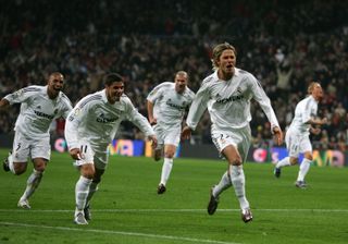 David Beckham celebrates with his Real Madrid team-mates after scoring a free-kick against Cadiz at the Santiago Bernabeu in 2006.