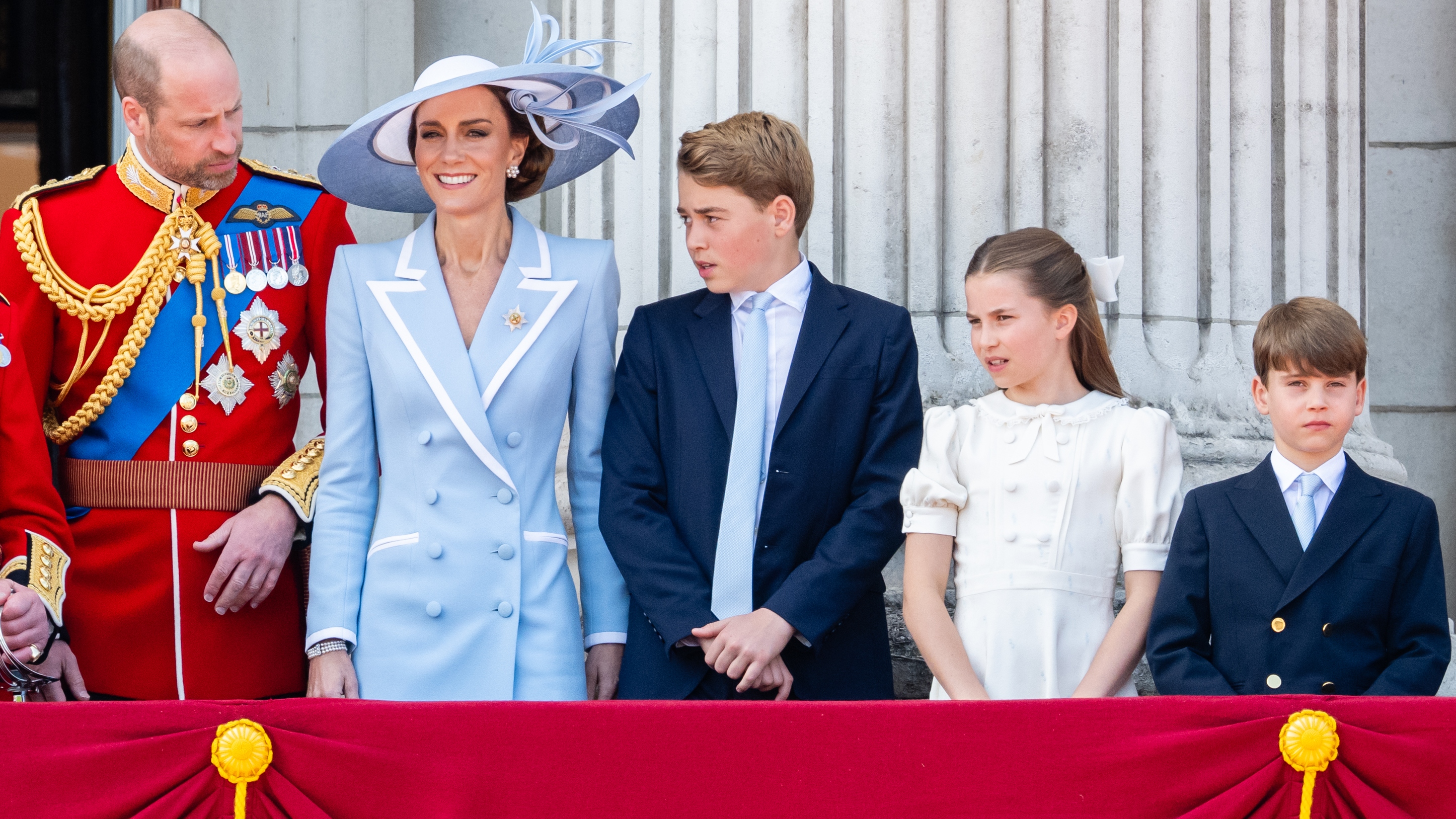 Prince William, Catherine, Princess of Wales, Prince George, Princess Charlotte and Prince Louis watch an RAF flypast from the balcony of Buckingham Palace during Trooping The Colour on June 13, 2026