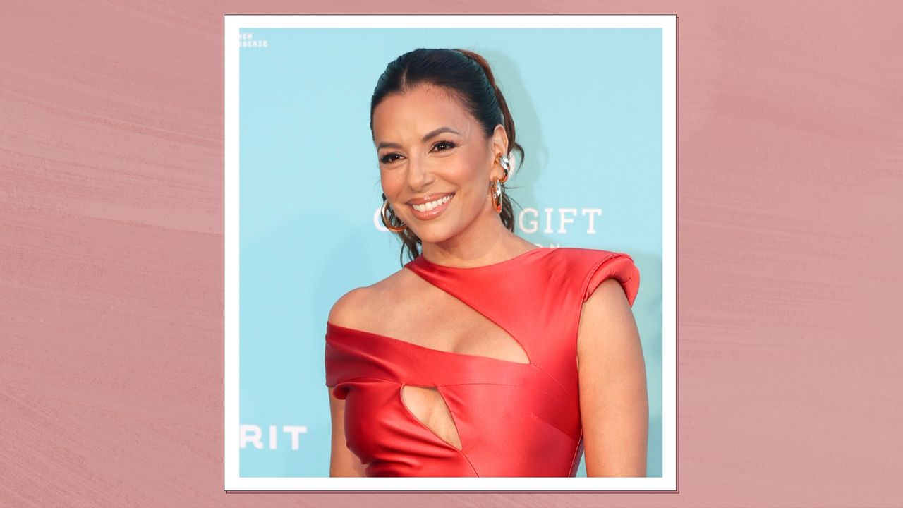 Eva Longoria is pictured wearing a red satin dress, with her hair in a curly ponytail whilst attending the Global Gift Gala Red Carpet at Hotel Don Pepe on July 21, 2024 in Marbella, Spain/ in a dark pink template