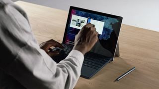 The Surface Pro 6 being used on a tabletop.