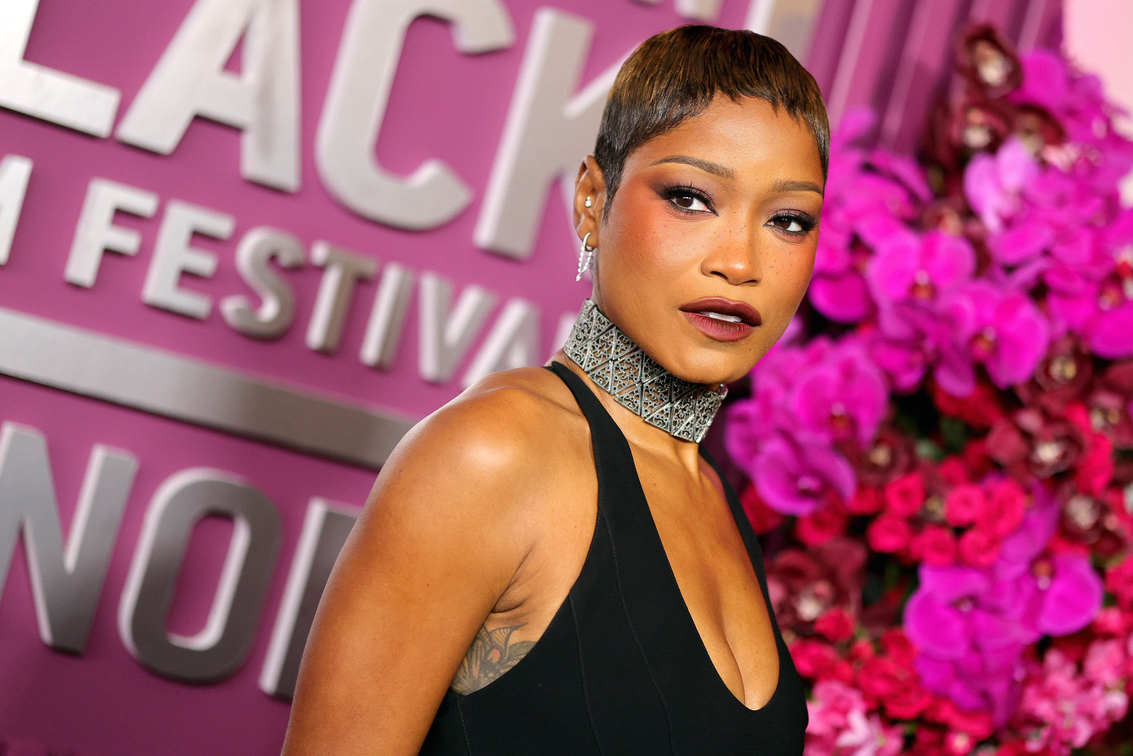 Keke Palmer attended the American Black Film Festival Honors in a black halter-neck dress and the 2026 choker trend