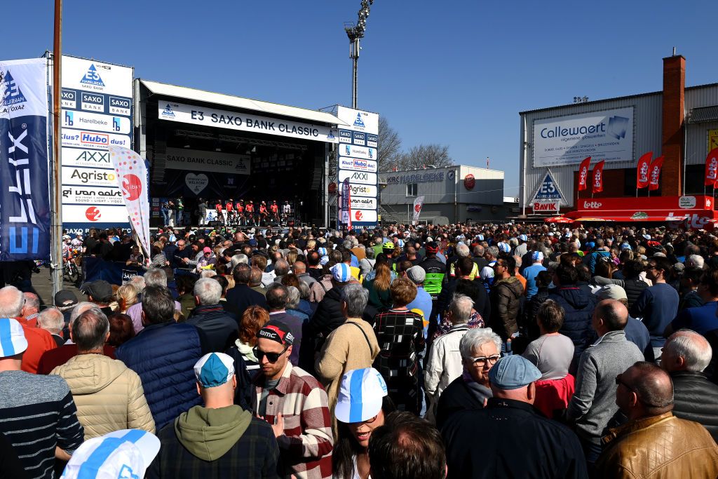 HARELBEKE BELGIUM MARCH 25 Matej Mohoric of Slovenia Heinrich Haussler of Australia Filip Maciejuk of Poland Jonathan Milan of Italy Kamil Gradek of Poland Fred Wright of United Kingdom Yukiya Arashiro of Japan and Team Bahrain Victorious during the team presentation prior to the 65th E3 Saxo Bank Classic 2022 a 2039km one day race from Harelbeke to Harelbeke E3SaxobankClassic WorldTour on March 25 2022 in Harelbeke Belgium Photo by Tim de WaeleGetty Images