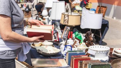 woman shopping at a garage sale