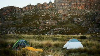 where not to camp: tents and cliff
