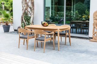 Teak furniture set in a patio