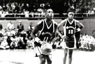 a young basketball player prepares to make a shot in the movie hoop dreams