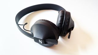 The sennheiser hd 250bt on-ear headphones in black pictured on a white surface