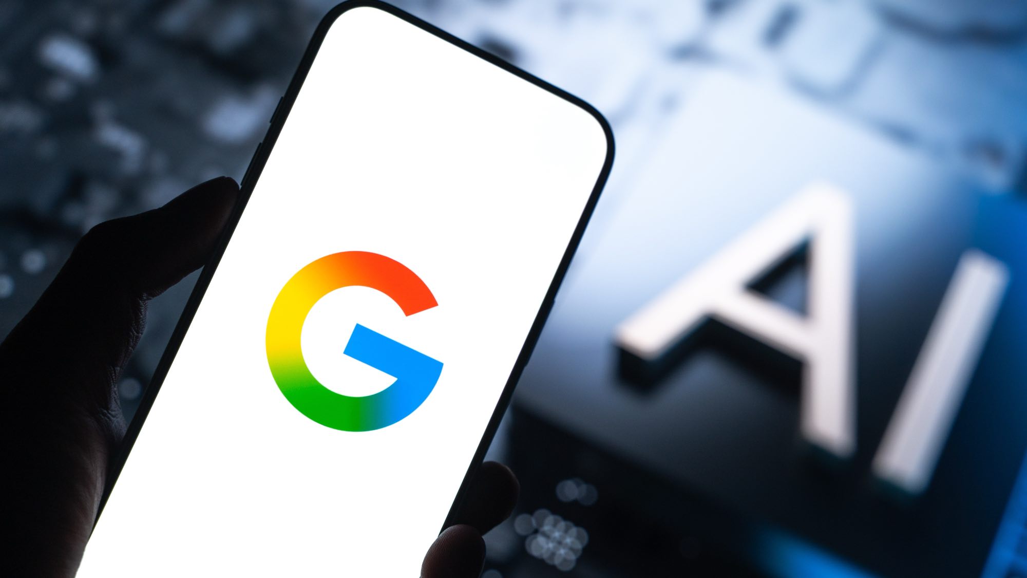 Google logo on phone next to AI 