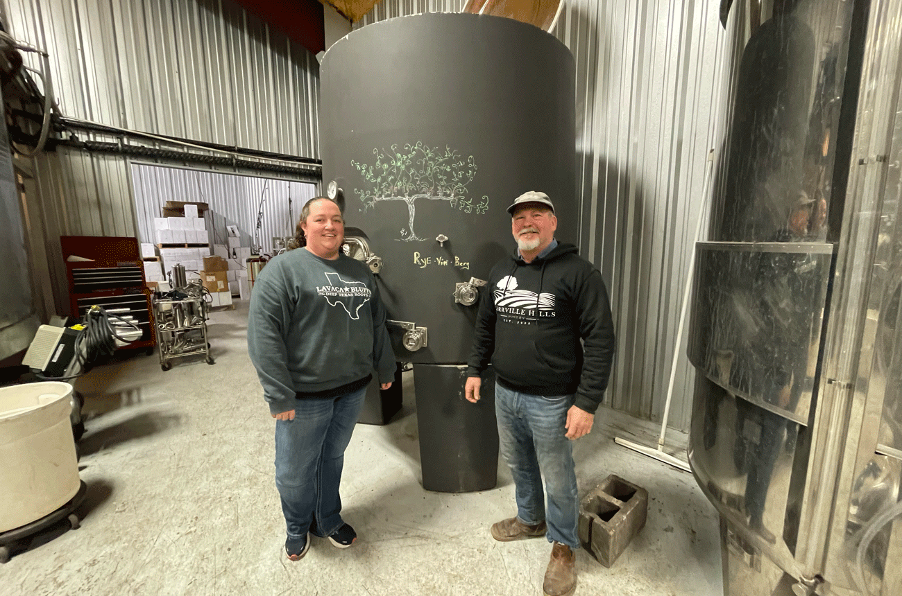 Production-Winemaker-Meredith-Reed-and-John-J.-Rivenbrugh-owner-of-Rivenburgh-Beverage-Company-Rivenburgh-Wine-and-Kerrville-Hills-Winery.gif