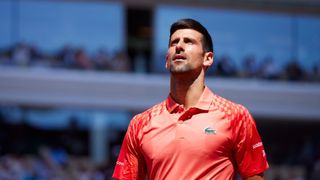 Novak Djokovic of Serbia looks on against Aleksandar Kovacevic of United States during their Men's Singles First Round Match on Day Two of the 2023 French Open at Roland Garros on May 29, 2023 in Paris, France.