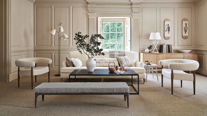 White sofa living room ideas with taupe walls and white curved armchairs