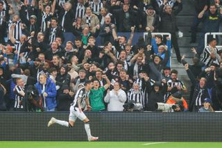 Miguel Almiron of Newcastle United celebrates after scoring his side's first goal during the UEFA Champions League match between Newcastle United FC and Paris Saint-Germain at St. James Park on October 04, 2023 in Newcastle upon Tyne, England. (Photo by James Gill - Danehouse/Getty Images)