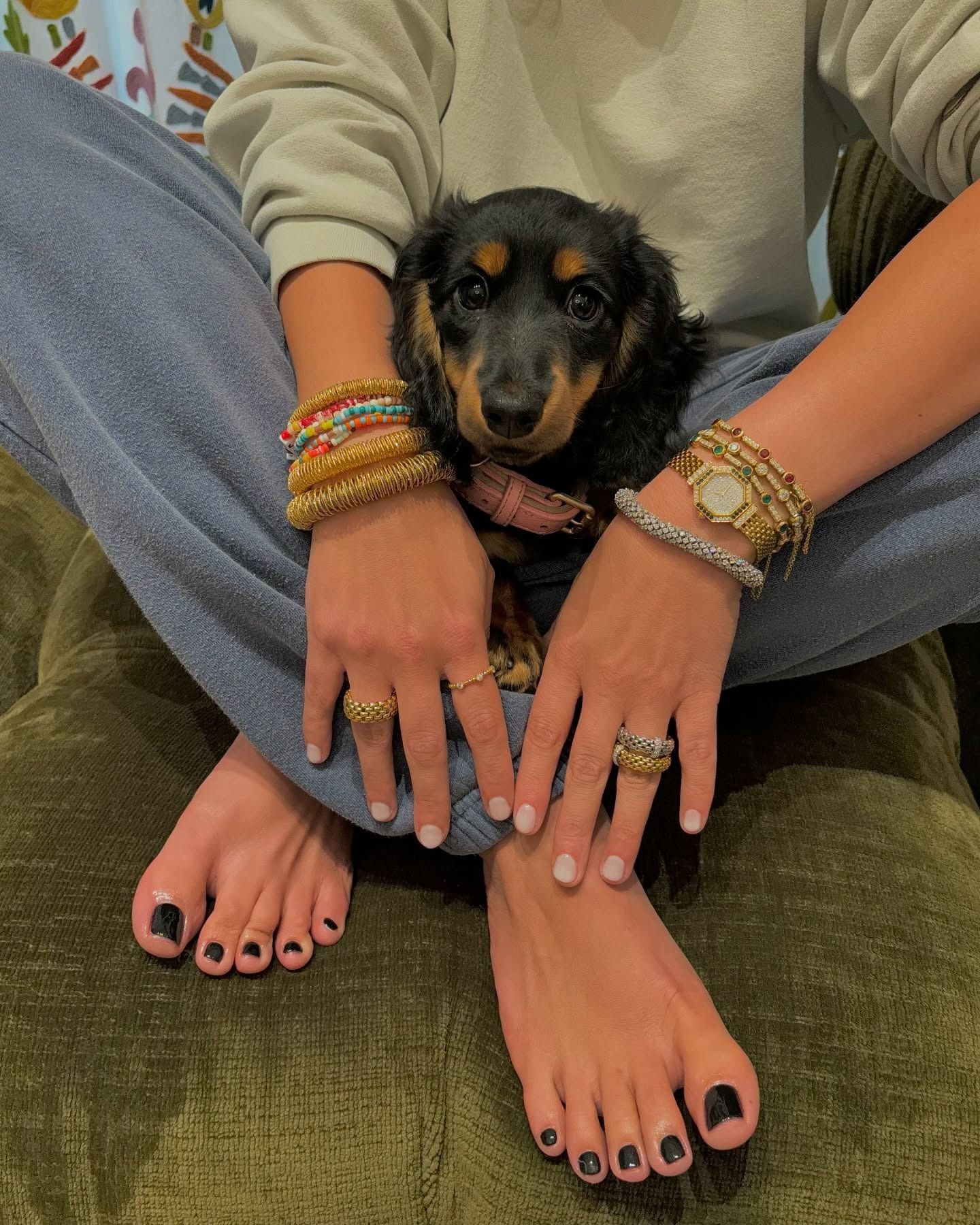 Milky manicure colour with a black pedicure colour