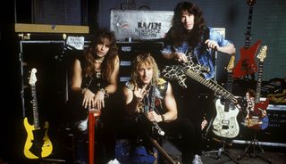 British metal group Raven pose in January 1988. From left: Joe Hasselvander, Mark Gallagher and John Gallagher