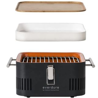 Everdure Cube BBQ in black with white lid and bamboo lid