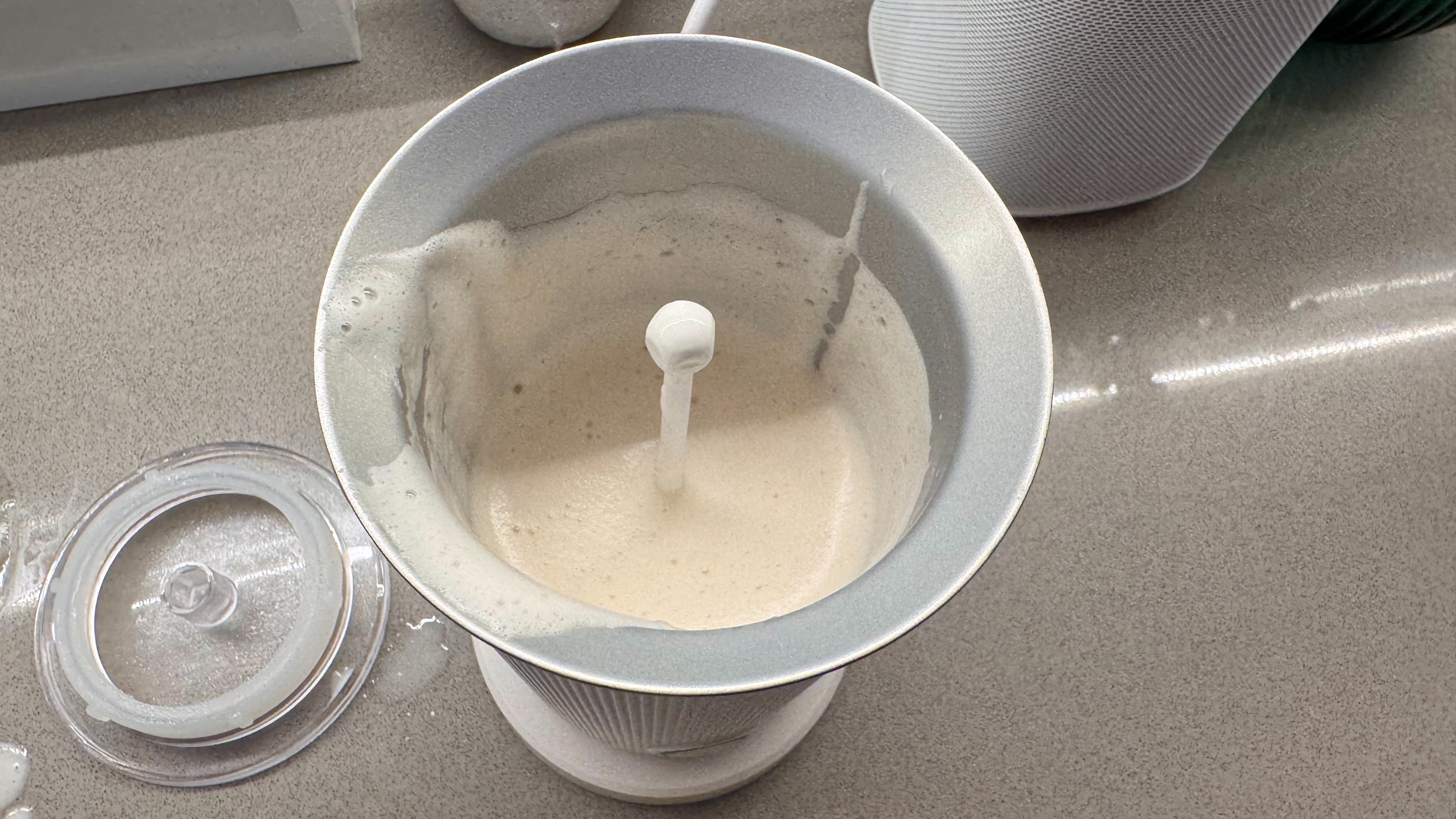 Philips Baristina Milk Frother with milk inside