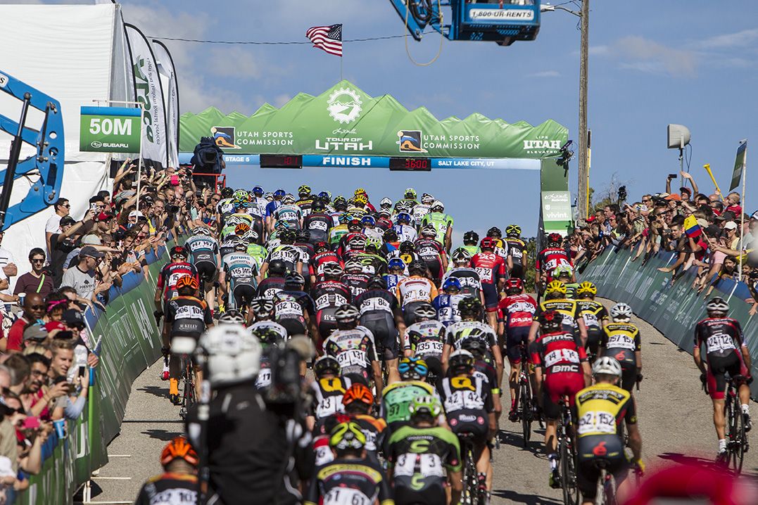 Riders pass under the finish-line truss during stage 5 at the Tour of Utah.