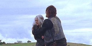 Daryl tries to shield Carol in The Walking Dead.