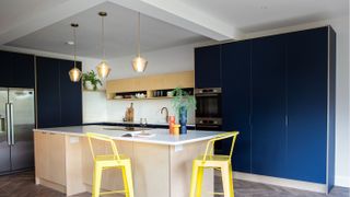 blue kitchen with split level ceiling