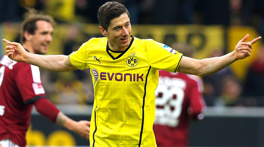 Robert Lewandowski celebrates scoring for Borussia Dortmund as Manchester United show an interest