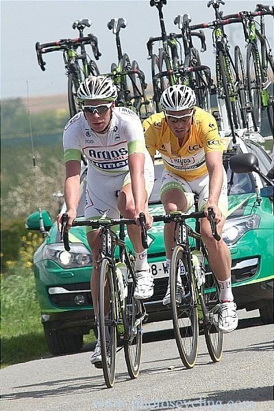Race leader John Degenkolb (Argos-Shimano) is paced back into the peloton by a teammate.