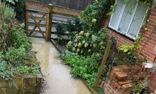 A flooded pathway at a home