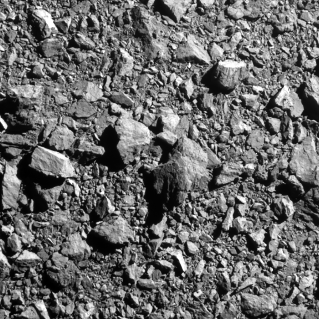 Breaking News a dense pile of rocks seen in shaded and white