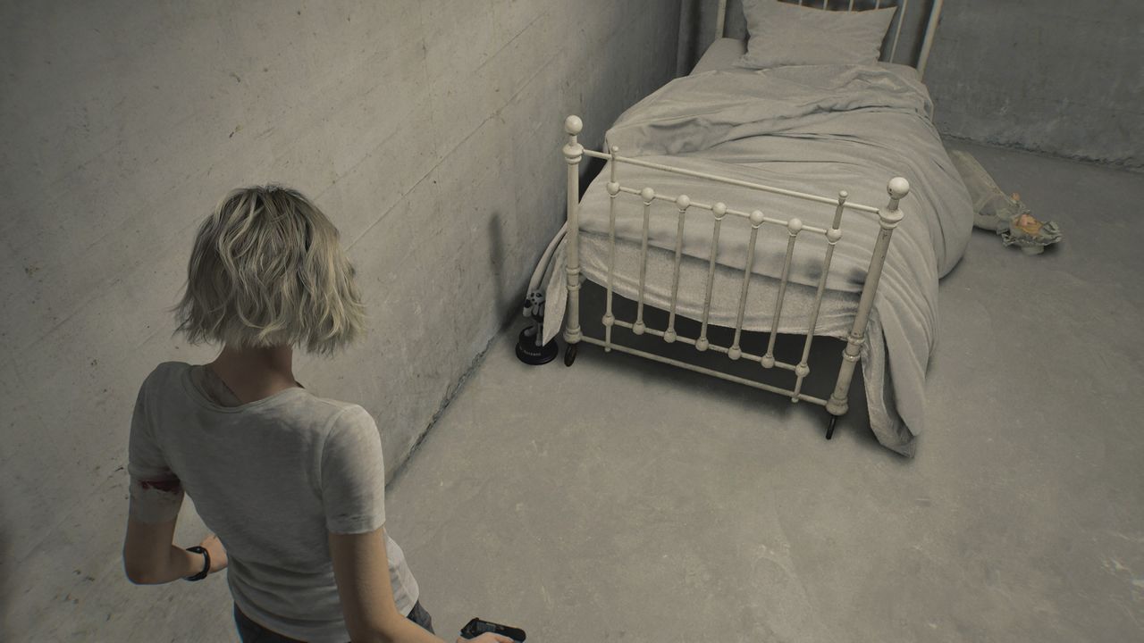 Resident Evil Requiem Mr. Raccoon behind a bed