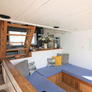 beach hut with wooden sofa and wooden flooring