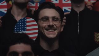 Timothee Chalamet smiling in Marty Supreme