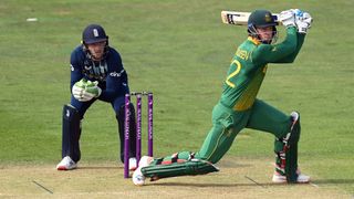 South Africa batsman Rassie van der Dussen hits out watched by Jos Buttler 