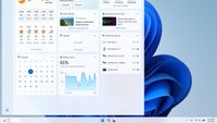 Windows 11 Widgets board displaying the Battery Flyout widget with system and Bluetooth device battery percentages.