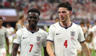 Bukayo Saka #7 and Declan Rice #4 of England react after the 4-2 win during the FIFA World Cup 2026 Group L match between England and Croatia at Dallas Stadium on June 17, 2026 in Arlington, Texas