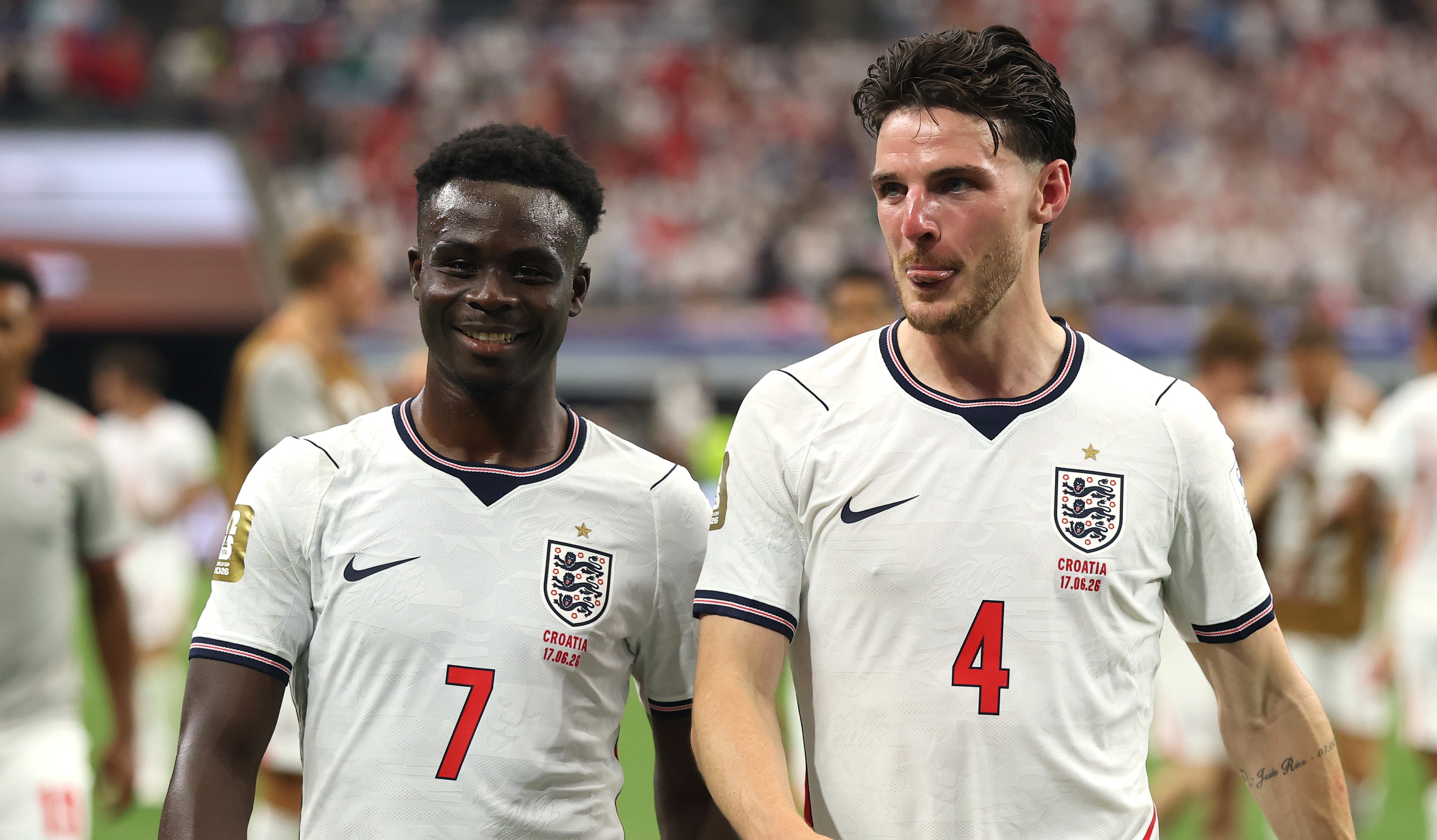Bukayo Saka #7 and Declan Rice #4 of England react after the 4-2 win during the FIFA World Cup 2026 Group L match between England and Croatia at Dallas Stadium on June 17, 2026 in Arlington, Texas