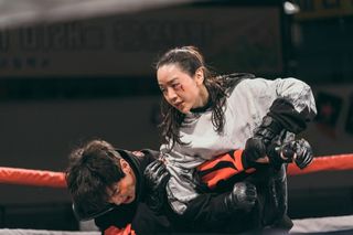 A female boxer fights against a male opponent, in 'Brave Citizen.'