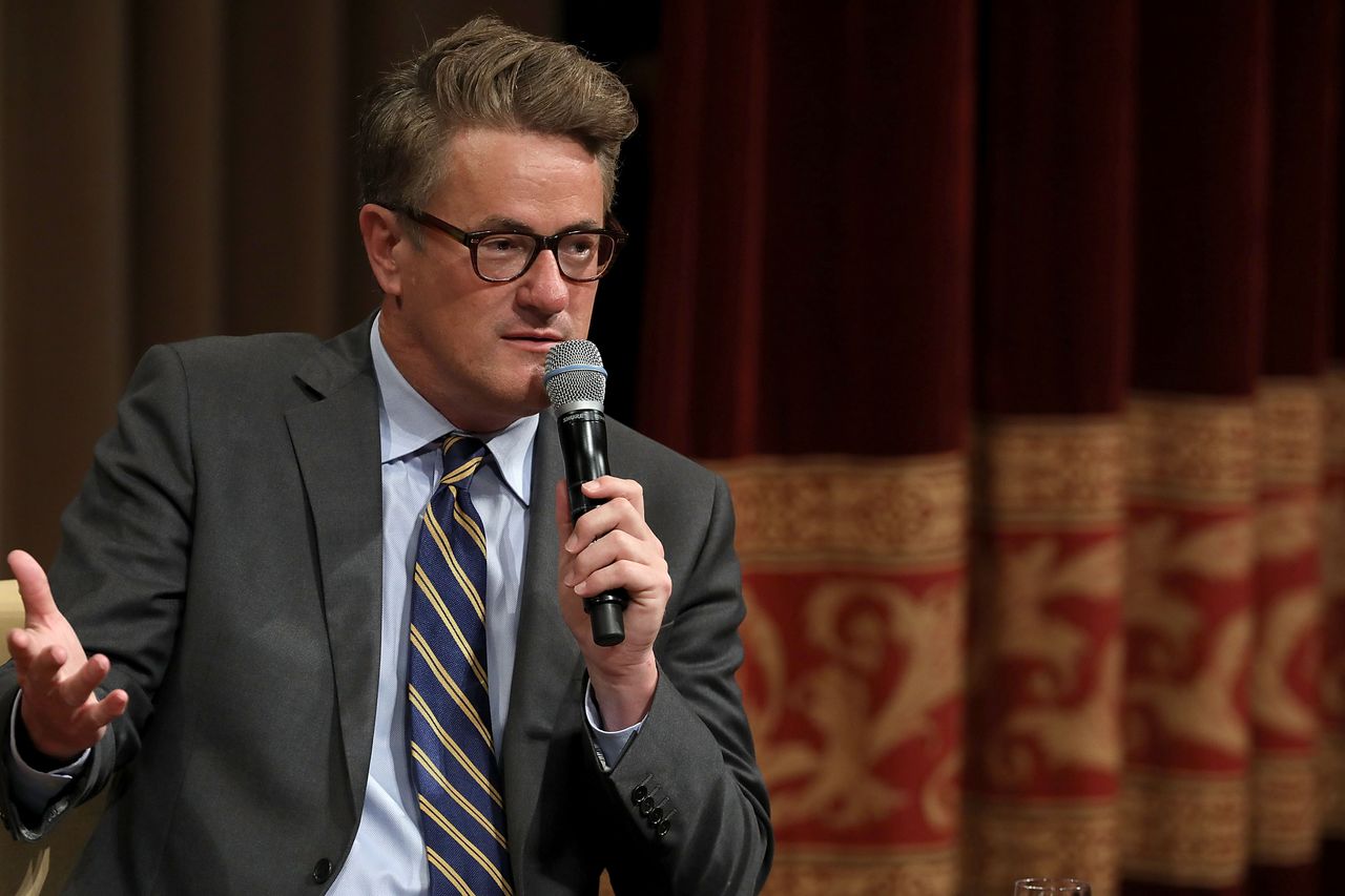 Morning Joe co-host Joe Scarborough speaks with David Rubenstein during a Harvard Kennedy School Institute of Politics event.