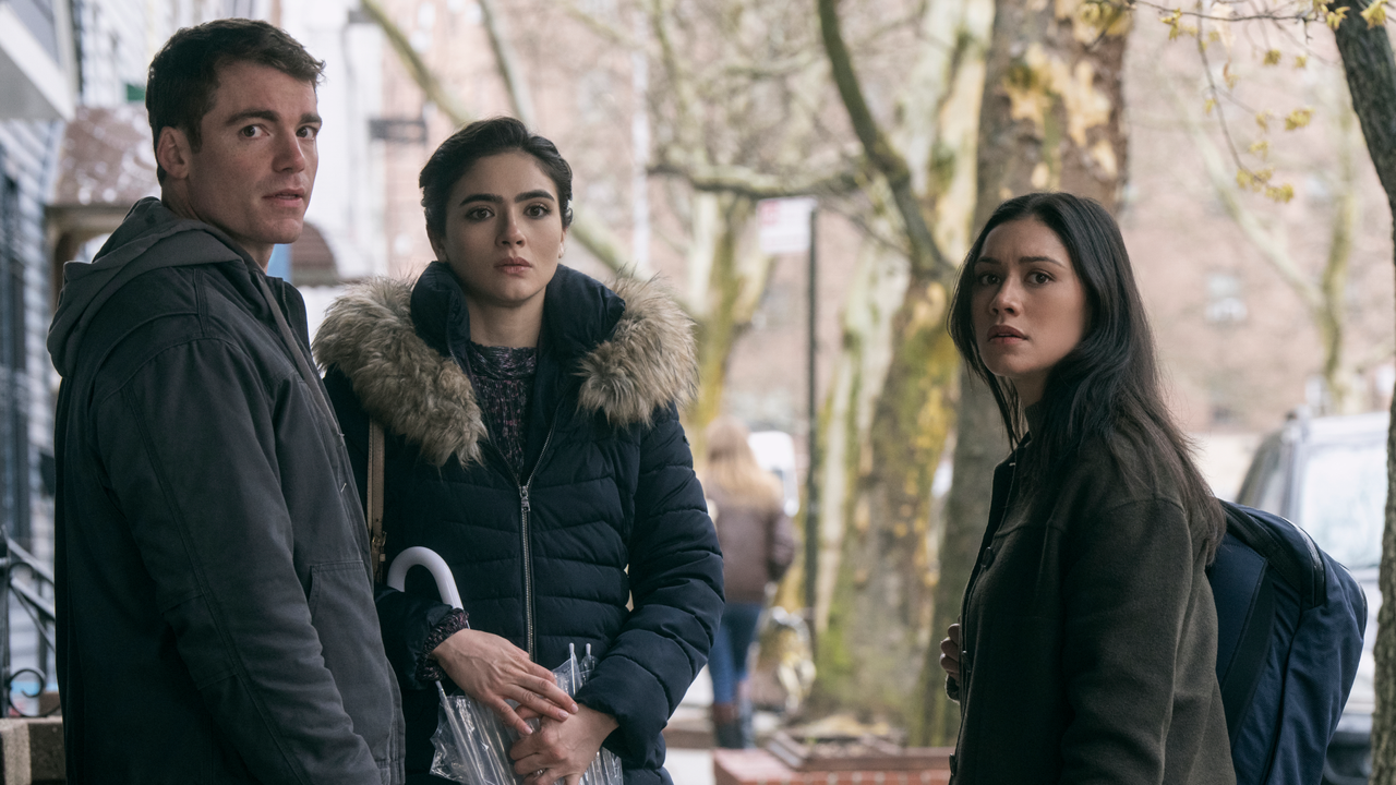 Gabriel Basso as Peter Sutherland, Arienne Mandi as Noor, Luciane Buchanan as Rose Larkin standing on a new york street in the night agent season 2