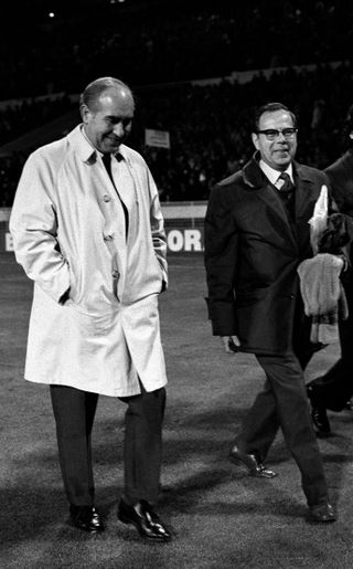 Sir Alf Ramsey leaves the pitch after what proved to be his final match as England manager