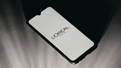 phone screen displaying L'Oreal