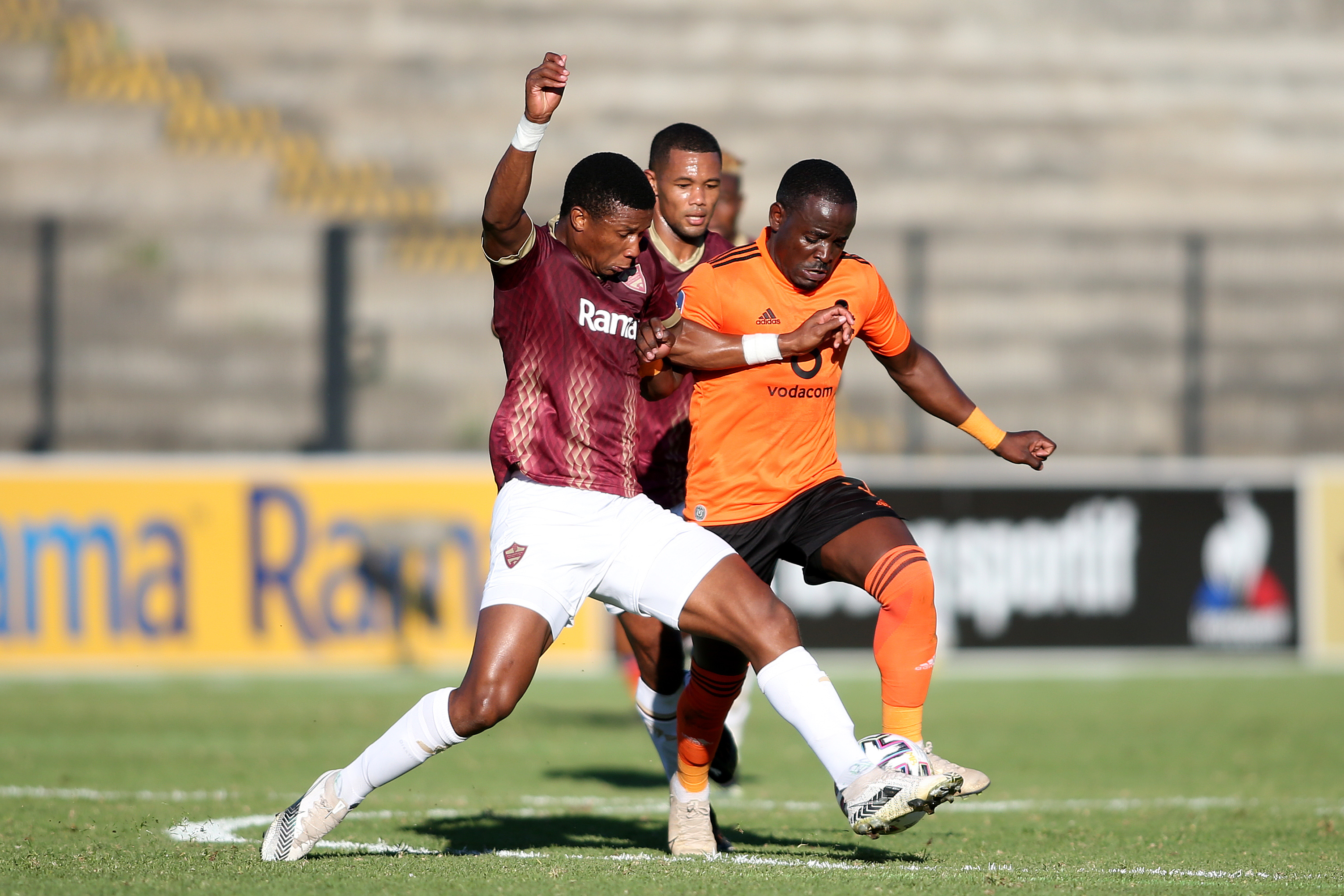 Sibusiso Mthethwa challenges Gabadinho Mhango for possession