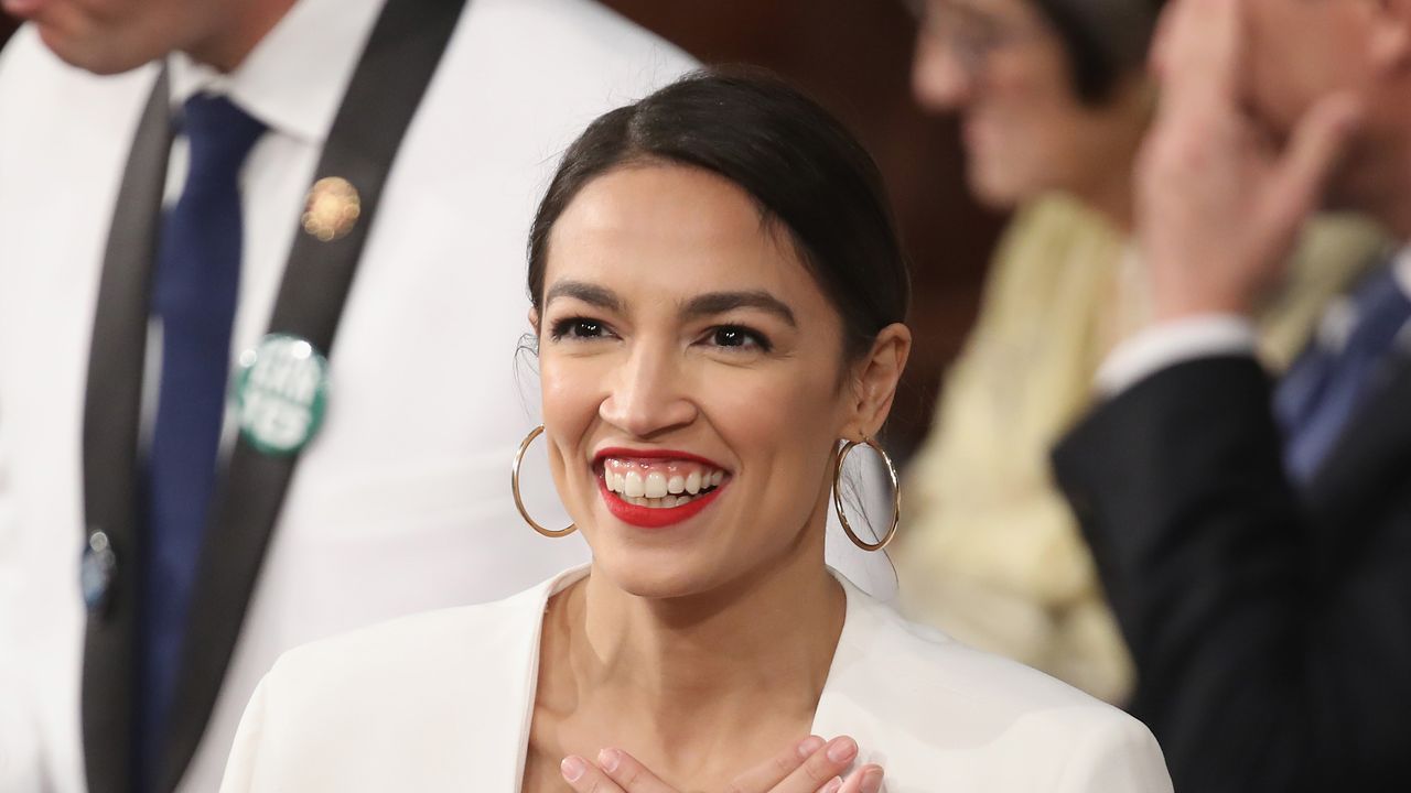 U.S. Rep. Alexandria Ocasio-Cortez (D-NY) greets fellow lawmakers ahead of the State of the Union address in the chamber of the U.S. House of Representatives on February 5, 2019 in Washington, DC