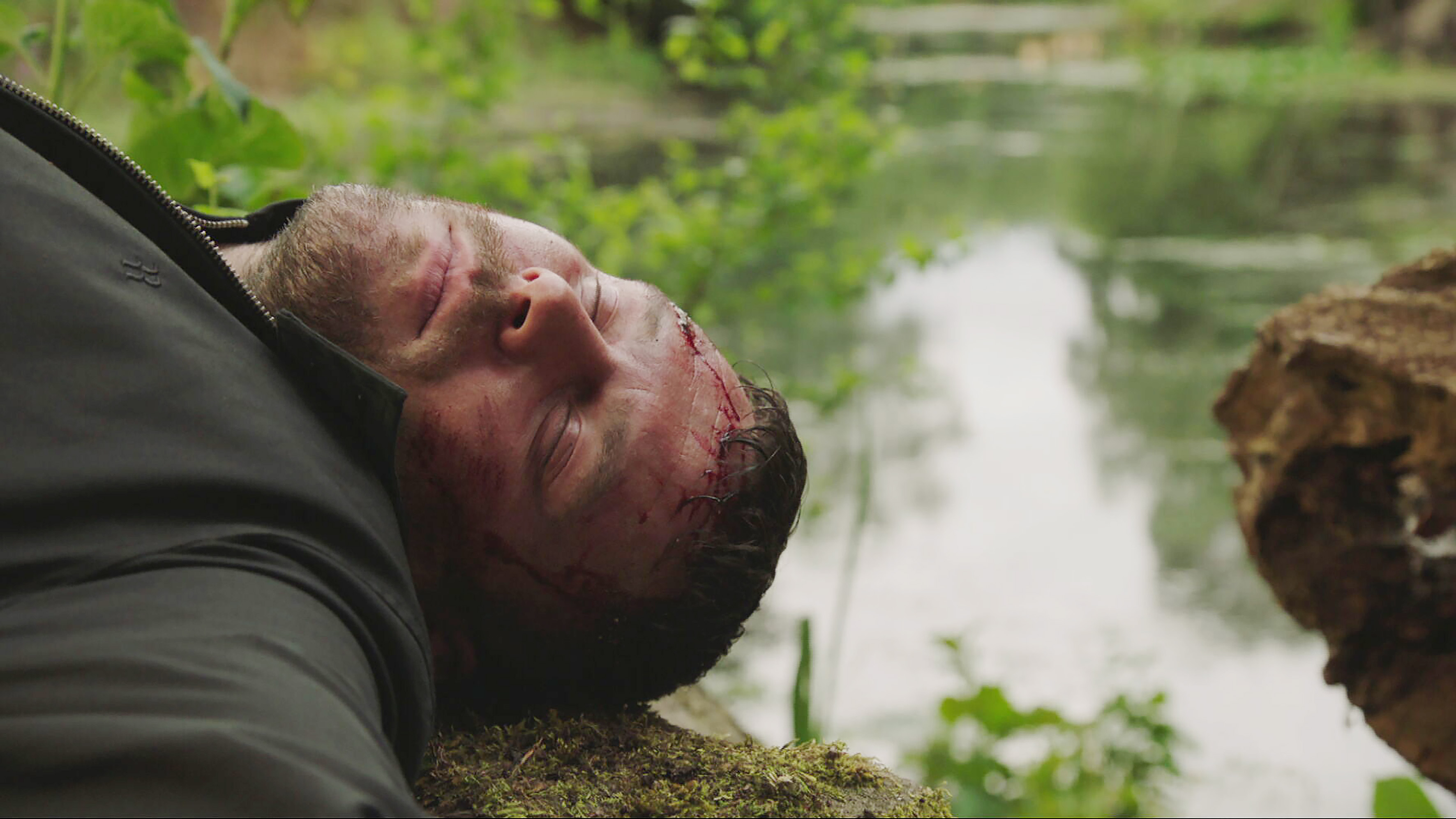 Aaron lies lifeless on the ground