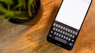 OpenBoard keyboard app on an Android phone.