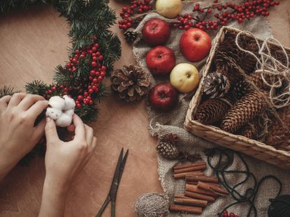 Person Making A DIY Christmas Wreath