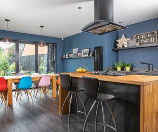 large kitchen diner with blue walls