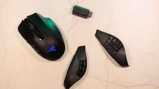 Razer mouse and components against a white background